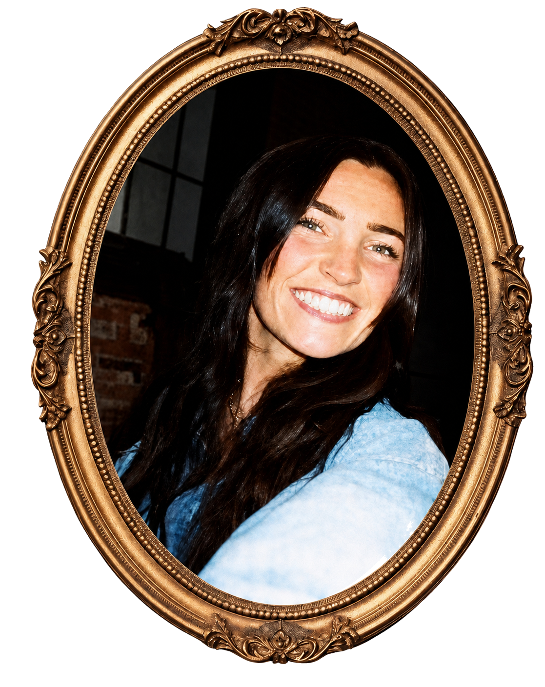 Steph Evans smiling in an ornate gold oval frame